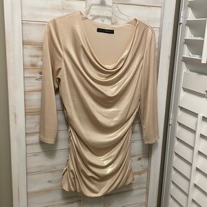 Gold and soft - form flattering. 3/4 length sleeves.